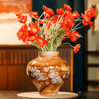 White ceramic hydroponic vase with minimalist design, styled as a decorative home accent for fresh or dried flowers