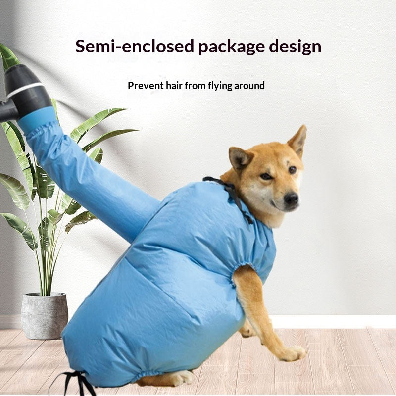 Pet drying bag open on a flat surface showing mesh ventilation panels and zipper closure for blow dry grooming
