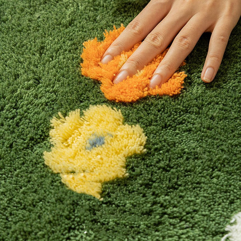 Soft area rug with floral and plant print pattern, shown flat with non-slip backing detail for home flooring