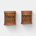 Two solar woven deck accent lights with warm filament LED glow, placed on wooden deck boards at dusk