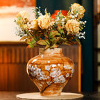 White ceramic hydroponic flower vase with minimalist design, styled as a decorative home accent on a neutral surface