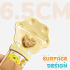 Cat treat squeeze spoon lickable feeder dispenser shown from multiple angles, highlighting the soft silicone tip and squeeze 