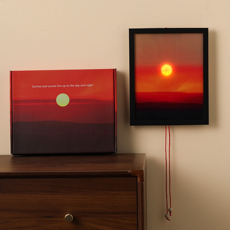 Sunset gradient levitating lamp glowing with warm amber and pink tones as a Tanabata ambient night light on a dark surface