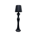 Warm light table lamp casting a soft amber glow on a bedside table, ideal for bedroom decor and nighttime ambiance.