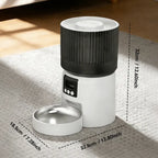 Automatic pet feeder with built-in camera showing app control interface on a smartphone screen