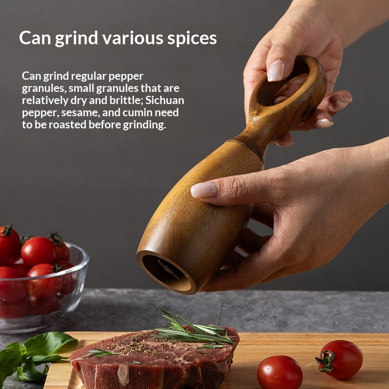 Desert Ironwood Pepper Mill with manual ceramic grinder, side view showing natural wood grain texture and grinder mechanism