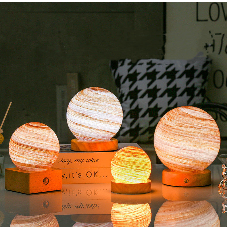 USB lantern night lamp casting a warm rainbow sunset glow on a table as ambient mood lighting