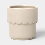 Cream ceramic planter pot with drainage hole, ideal for succulents and small outdoor plants