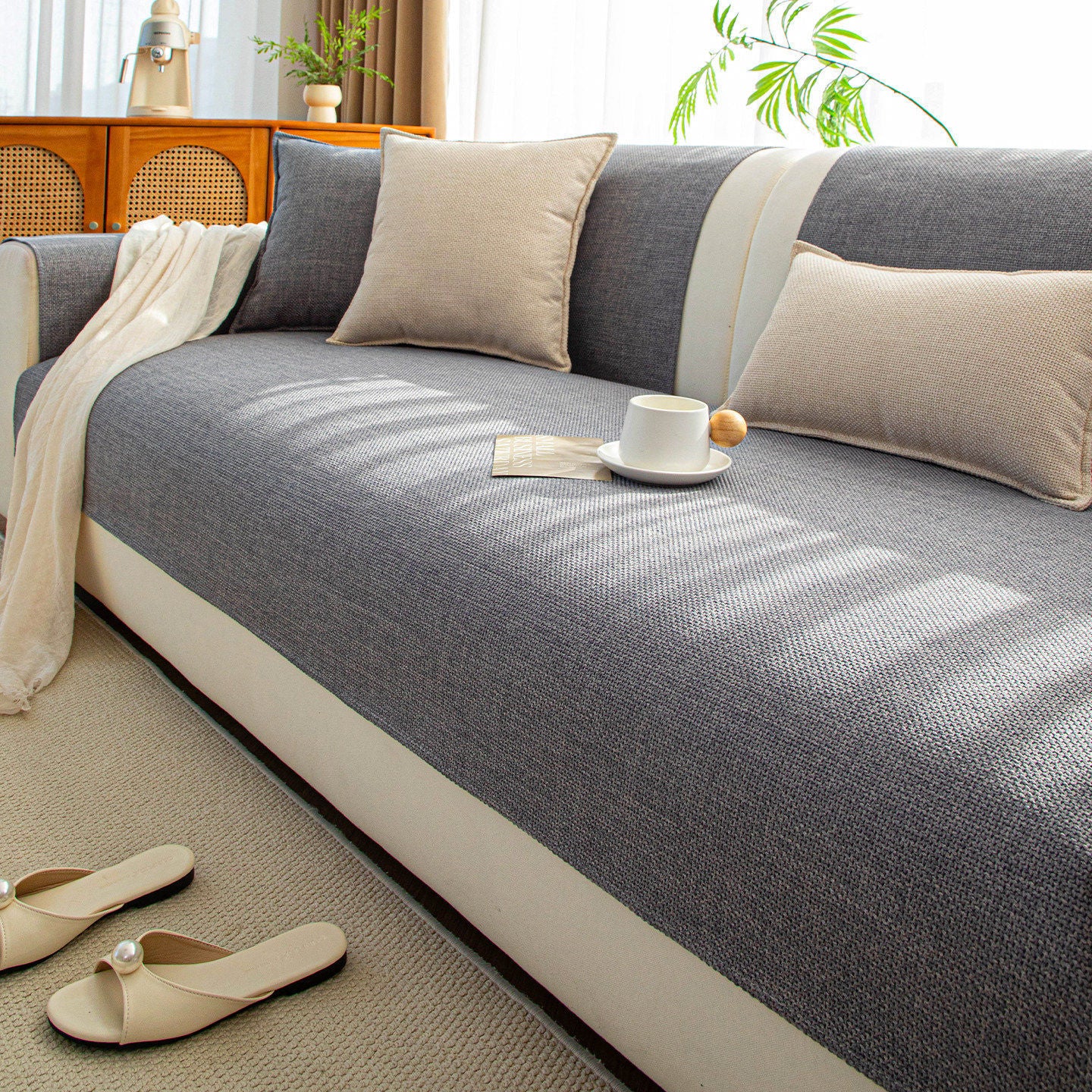 Close-up of a Japanese-style faux cotton-linen sofa cushion cover with a textured woven finish in a neutral tone